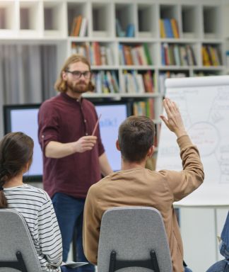 Man conducting a seminar in a library