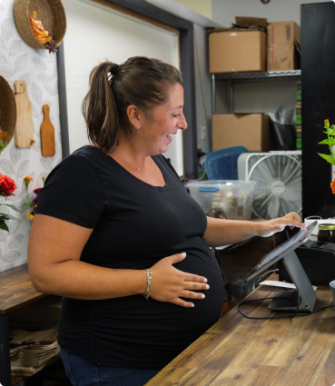 Pregnant woman with hand on belly