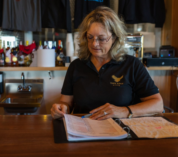 Woman looking at a binder